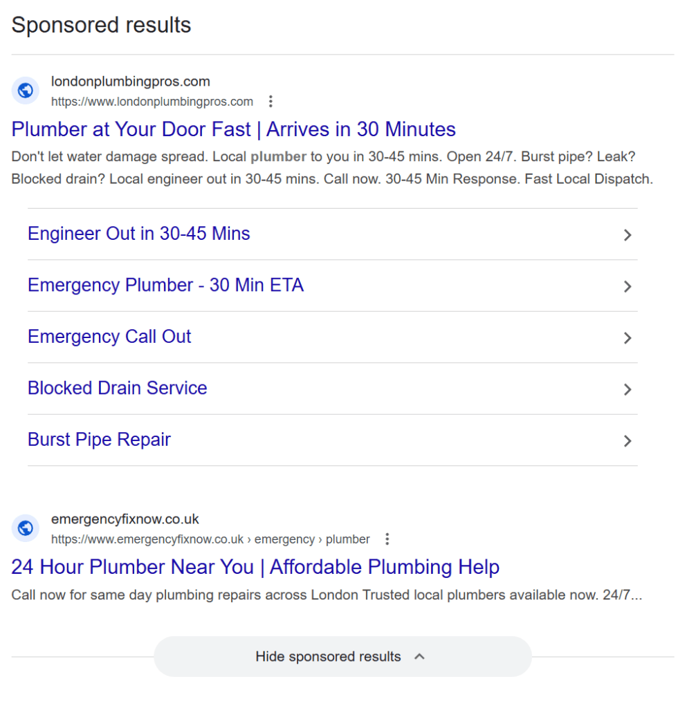 google search results page showing paid ads at the top for a plumber search